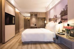 Letto o letti in una camera di Atour Hotel Guilin North Railway Station