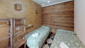 Giường trong phòng chung tại Molino Romano