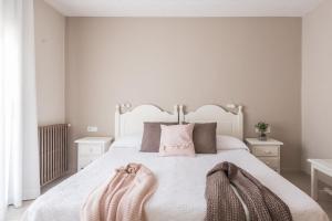 Postel nebo postele na pokoji v ubytování Hostal Buenos Aires