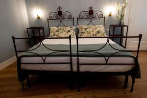 Postel nebo postele na pokoji v ubytování Locanda Capolago