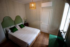 Postel nebo postele na pokoji v ubytování Locanda Capolago
