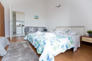 Postel nebo postele na pokoji v ubytování Apartments Rudi