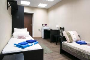 
Кровать или кровати в номере Hostel Agat

