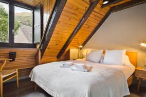 Posteľ alebo postele v izbe v ubytovaní Luderna - Casa con terraza dera Aubeta