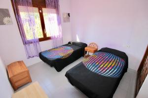 Posteľ alebo postele v izbe v ubytovaní Villa, piscine, WIFI. Locamar Silvia Cat.