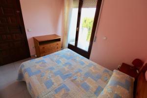 Posteľ alebo postele v izbe v ubytovaní Villa, piscine, WIFI. Locamar Silvia Cat.