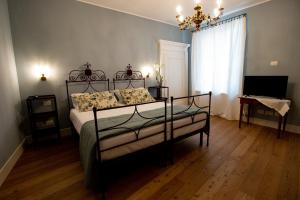 Postel nebo postele na pokoji v ubytování Locanda Capolago