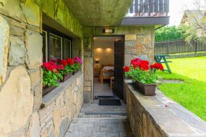 Vonkajšia záhrada v ubytovaní Apartament Ewa