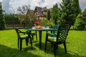 Vonkajšia záhrada v ubytovaní Apartament Ewa