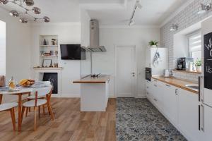 Kuchyň nebo kuchyňský kout v ubytování Scandi Apart Odessa