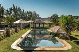 A view of the pool at Orange River Rafting Lodge or nearby