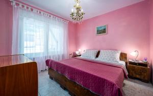 Postel nebo postele na pokoji v ubytování Apartment Crveni