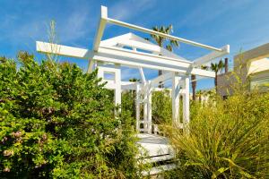 A garden outside La Blanche Resort & Spa