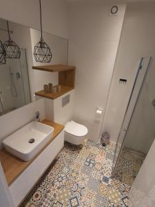 Kúpeľňa v ubytovaní Złota Wydma - M&K Apartamenty