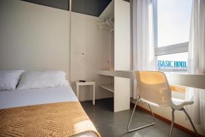 Postel nebo postele na pokoji v ubytování Basic Braga by Axis