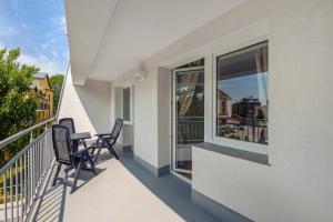Balkón alebo terasa v ubytovaní Apartamenty Sun & Snow w Rezydencji Bielik