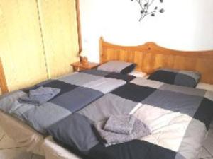Łóżko lub łóżka w pokoju w obiekcie Casa Hibiscus sehr schönes Appartment zum relaxen