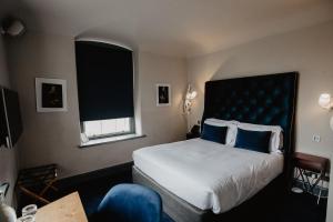 Rúm í herbergi á Bellinter House Hotel & Spa