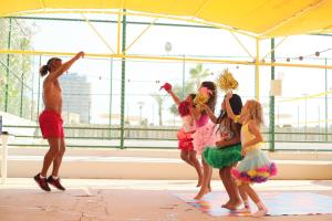 a group of people dancing in a dance class at Cimer SafraMarine Beach Resort in Safra +37 photos