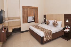 Foto da galeria de Sivamurugan Hotels em Kumbakonam