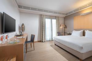 TV a/nebo společenská místnost v ubytování Central Hotel