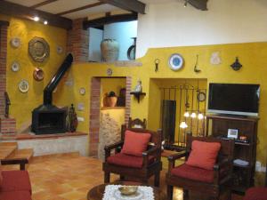 TV a/nebo společenská místnost v ubytování Casa rural ca l'Antoni (Tarragona)