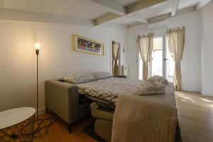 A bed or beds in a room at Casetta Gattini