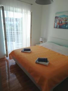Posteľ alebo postele v izbe v ubytovaní Apartment Pradini + 36 fotografií