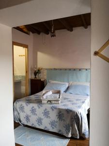 Ένα ή περισσότερα κρεβάτια σε δωμάτιο στο B&B DOMU INCANTO Sa Domu sarrabesa