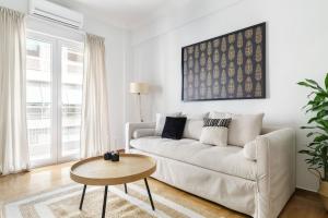 A seating area at Urban 2BD Apartment in Koukaki by UPSTREET