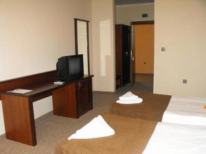 Postel nebo postele na pokoji v ubytování Hotel Park