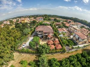 an aerial view of a house with a yard at B&B Pineta Mare in Lamezia Terme