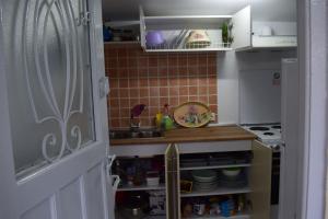 Kuchyň nebo kuchyňský kout v ubytování R apartment