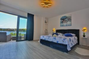 Säng eller sängar i ett rum på Hotel Paradise Punta