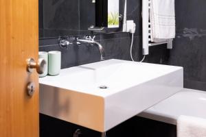 Un baño de Casas do Teatro