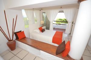 מיטה או מיטות בחדר ב-Casa Opuntia