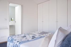 Cama o camas de una habitación en Casas do Teatro