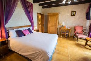A bed or beds in a room at La Terrasse - Teritoria