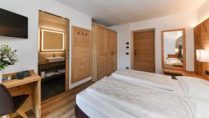 Voodi või voodid majutusasutuse Hotel Brunella toas