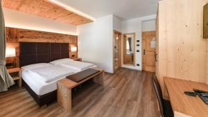 Voodi või voodid majutusasutuse Hotel Brunella toas