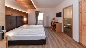 Voodi või voodid majutusasutuse Hotel Brunella toas