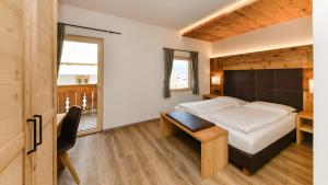 Voodi või voodid majutusasutuse Hotel Brunella toas