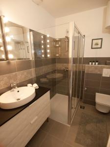 Koupelna v ubytování Apartments Barka + 23 fotografií