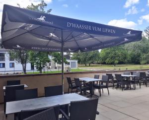 Un restaurante u otro lugar para comer en Péitche Lauer