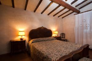 A bed or beds in a room at Agriturismo Borgo dei Ricci