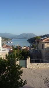 a view of a body of water from a house at Villa Lydia in Meganisi