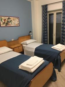 Postel nebo postele na pokoji v ubytování B&B Fleurs