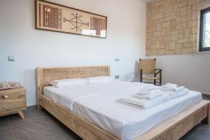 
Ein Bett oder Betten in einem Zimmer der Unterkunft PanMari
