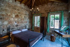 Postel nebo postele na pokoji v ubytování Gujadani Villa + 14 fotografií