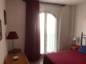 Posteľ alebo postele v izbe v ubytovaní Residencial Parque Azahar ll